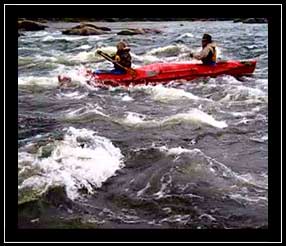Rod Lawrence canoeing rapids