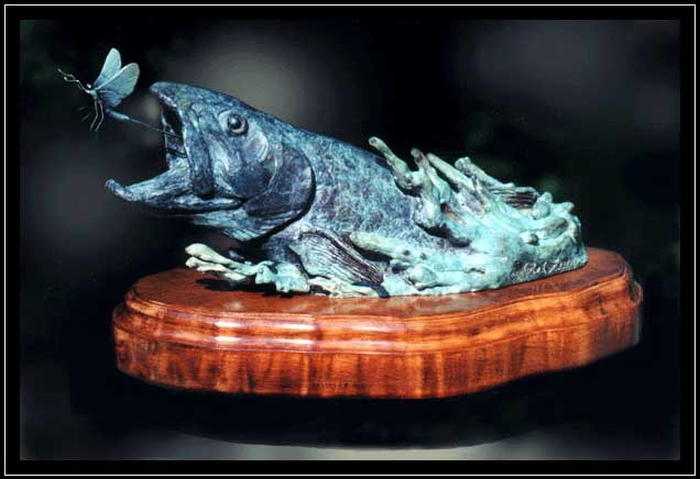 Bronze sculpture of trout and mayfly